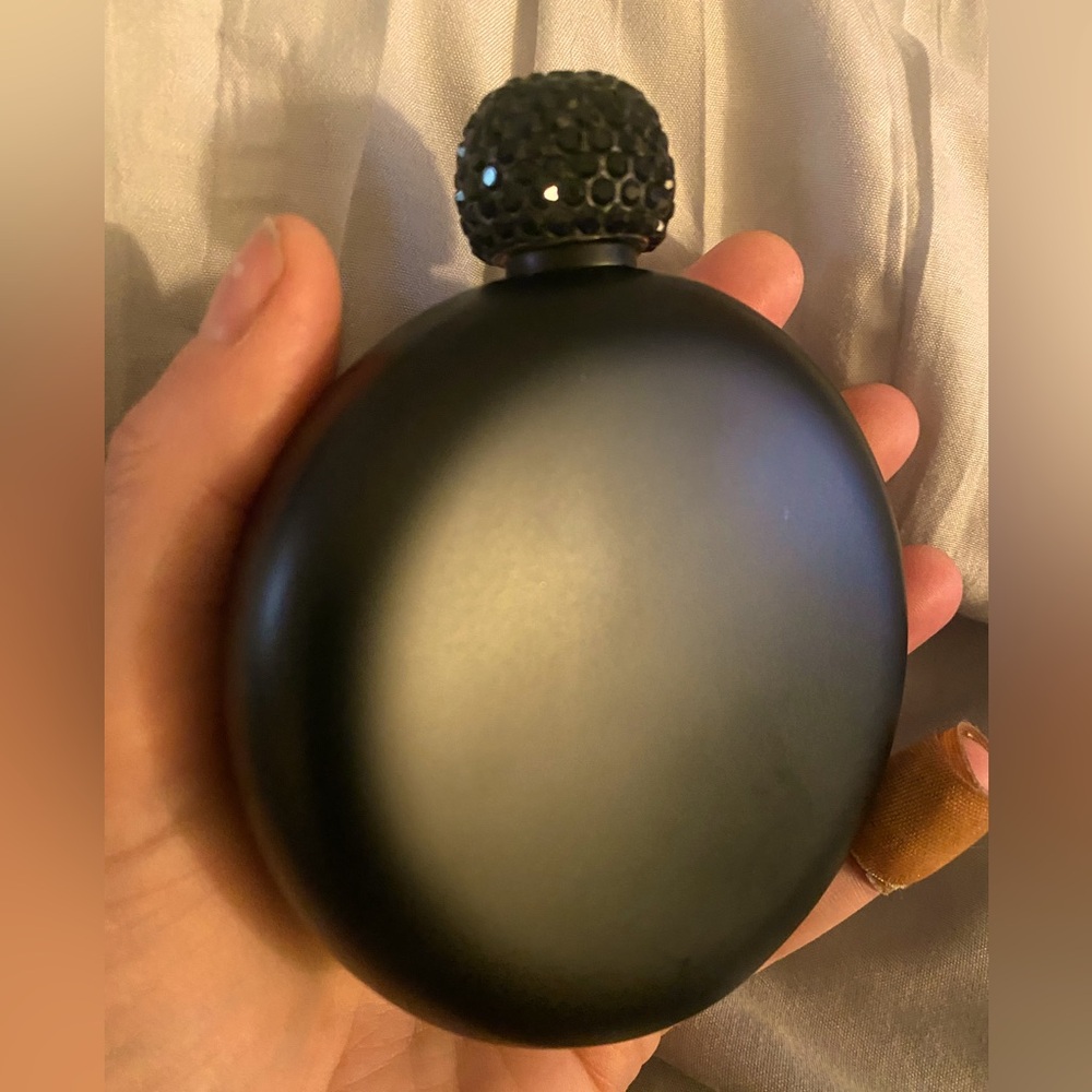 Matte black flask with bejeweled cap